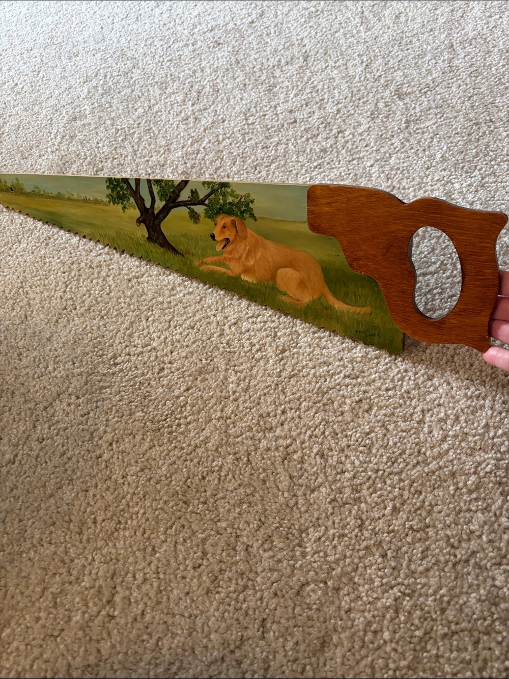 Hand-Painted Decorative Wooden Saw with Dog Scene in Green and Brown